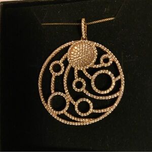 Rose gold filigree pendant